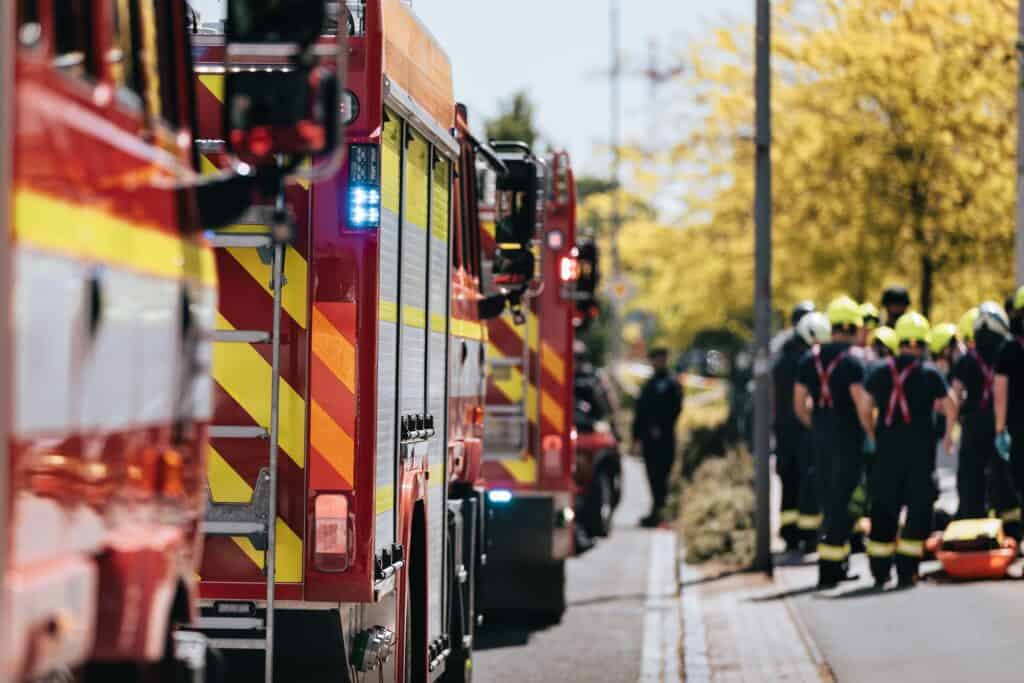 24 safety-related bills have passed state legislatures this year 3 Teams of fire brigade on city street.
